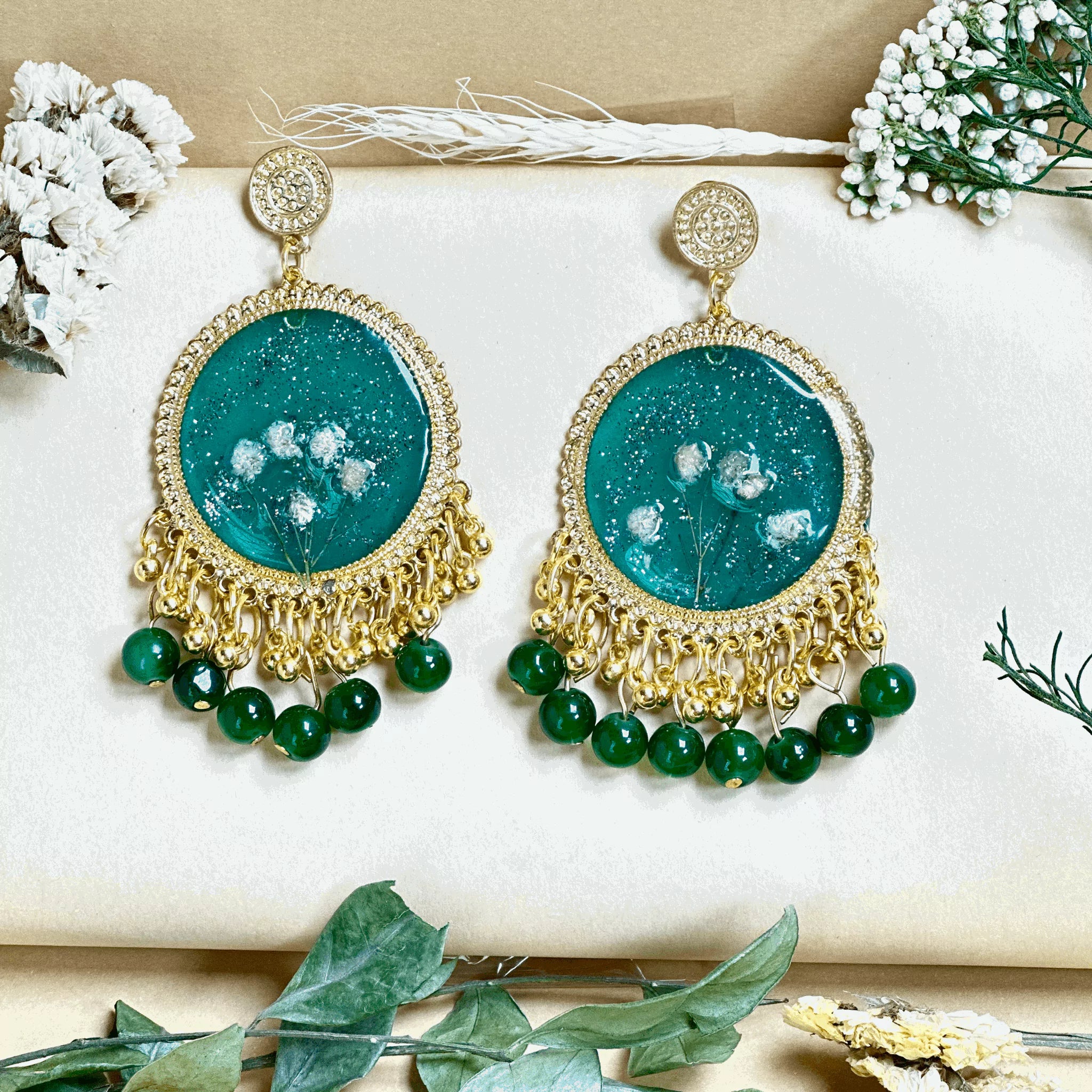 Emerald Elegance Resin Jhumkas