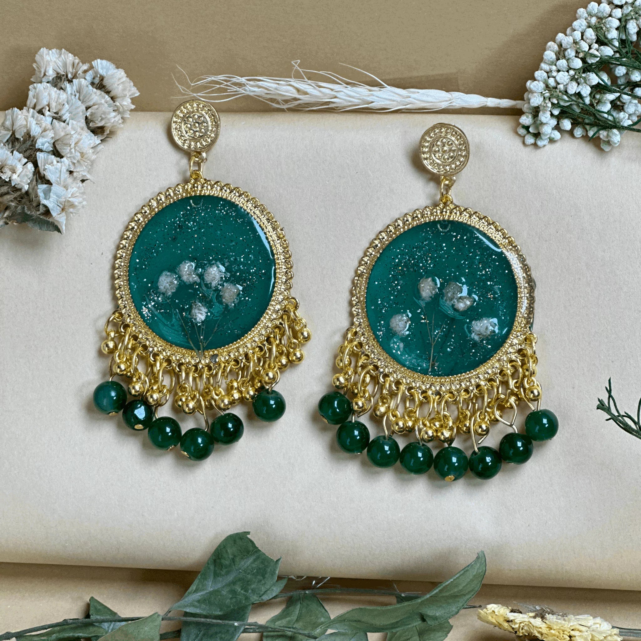 Emerald Elegance Resin Jhumkas