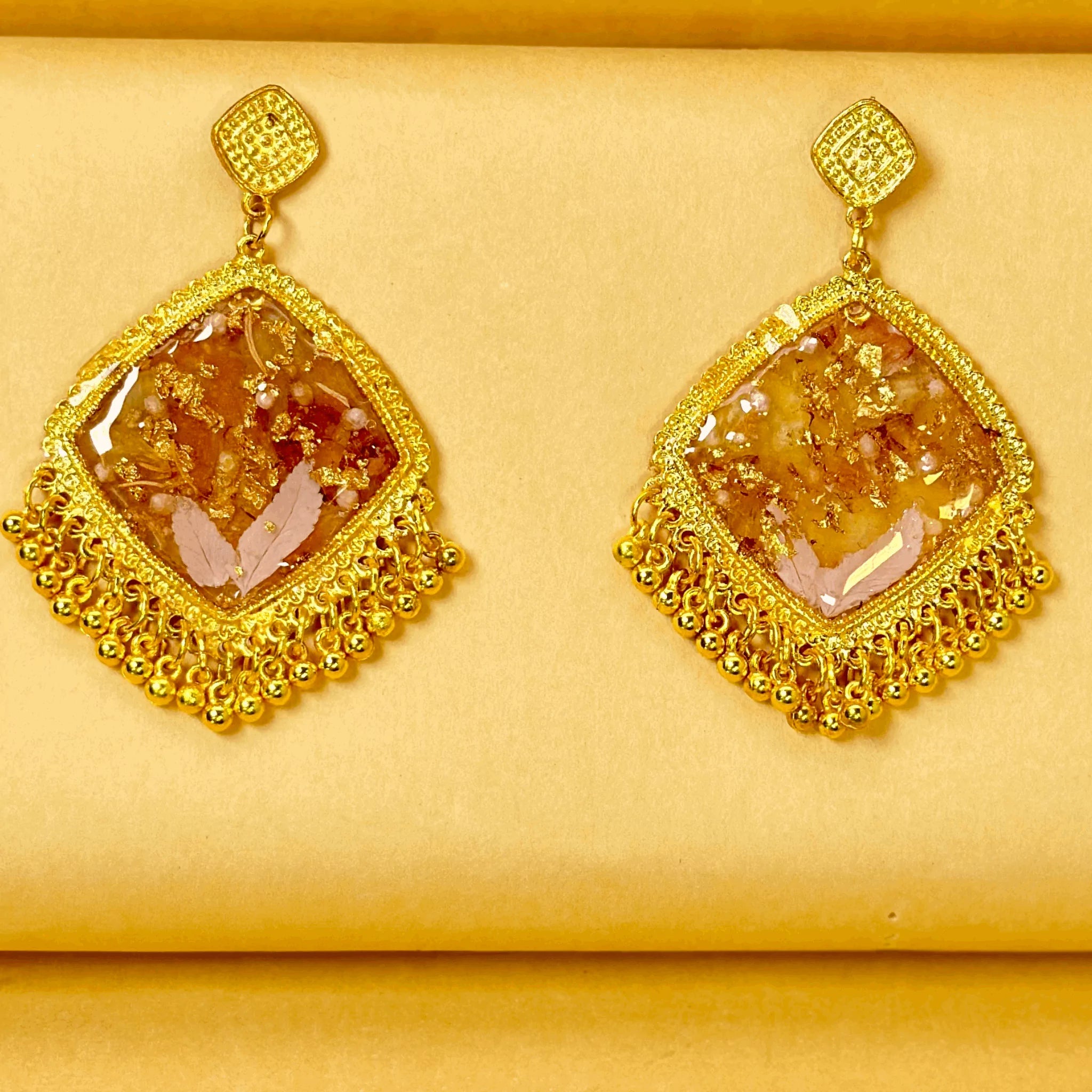 Golden Bloom Resin Jhumkas