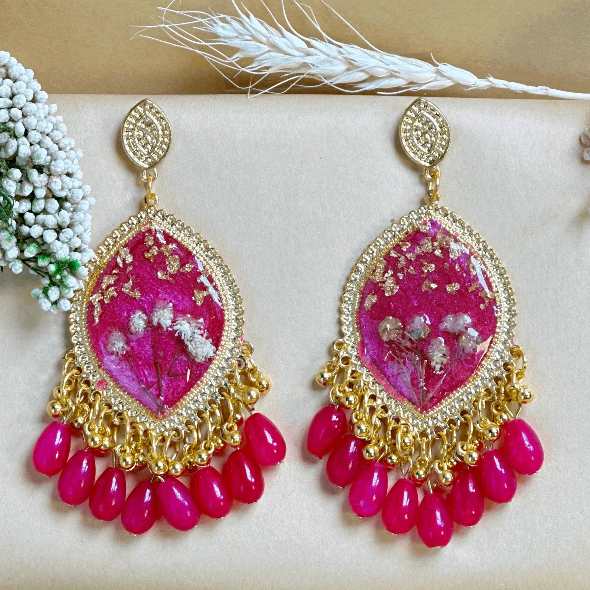 Golden Charm Resin Jhumkas